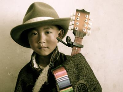 Nomad Child with Mandolin in Amdo, Tibet